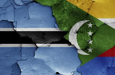 Flags of Botswana and Comoros painted on cracked wall Stock Illustration