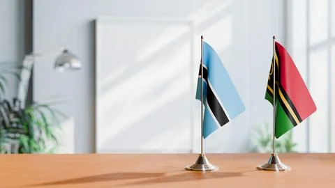 FLAGS OF BOTSWANA AND VANUATU ON TABLE Stock Photos