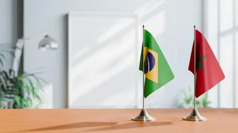 FLAGS OF BRAZIL AND MOROCCO ON TABLE Stock Photos