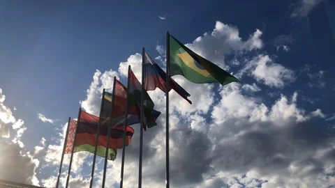 Flags Of BRICS Countries Waving In The Wind Against Blue Sky Stock Footage 109461218