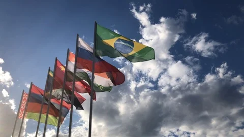 Flags Of BRICS Countries Waving In The Wind Against Blue Sky Vídeos de archivo 109461235