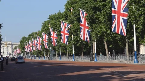The flags of Britain are hanging along the road. 動画素材 77518282