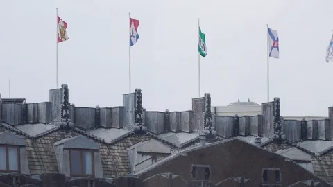 Flags on a building in amsterdam Stock Footage 91866953