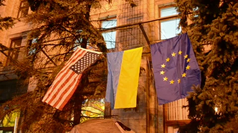 Flags on the building wall during Euro maidan meeting in Kiev, Ukraine Stock Footage 46557853
