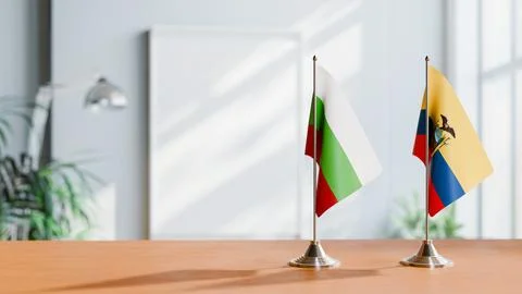 FLAGS OF BULGARIA AND ECUADOR ON TABLE Stock Photos