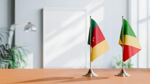 FLAGS OF CAMEROON AND CONGO R ON TABLE Stock Photos