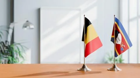 FLAGS OF CHAD AND ESWATINI ON TABLE Stock Photos