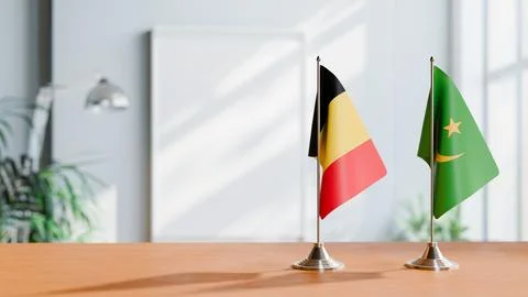 FLAGS OF CHAD AND MAURITANIA ON TABLE Stock Photos