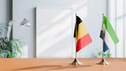 FLAGS OF CHAD AND SIERRA LEONE ON TABLE Stock Photos