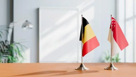 FLAGS OF CHAD AND SINGAPORE ON TABLE Stock Photos