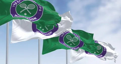Flags with The Championships Wimbledon logo waving in the wind Stock Footage 242510288