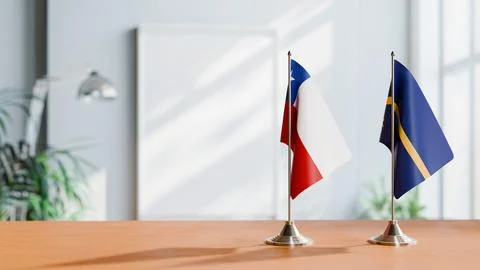 FLAGS OF CHILE AND NAURU ON TABLE Stock Photos