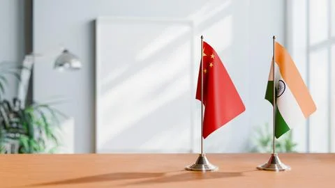 FLAGS OF CHINA AND INDIA ON TABLE Stock Photos