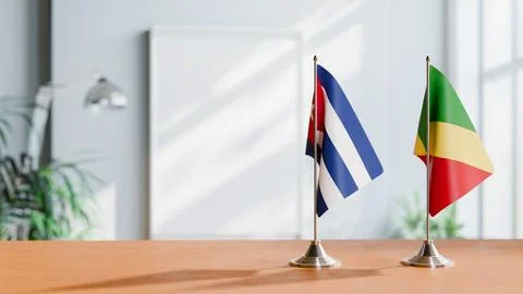 FLAGS OF CONGO R AND CUBA ON TABLE Stock Photos