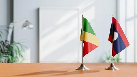 FLAGS OF CONGO R AND LAOS ON TABLE Stock Photos