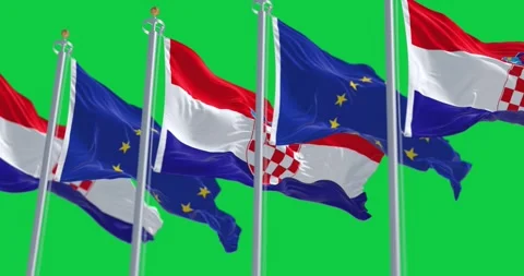 Flags of Croatia and the EU fluttering together isolated on green background Stock Footage 268468607