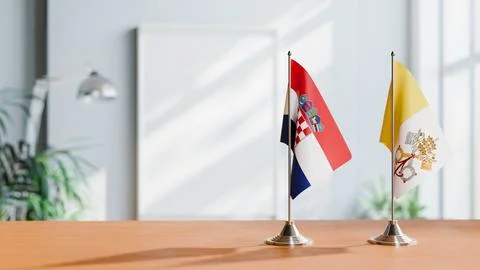FLAGS OF CROATIA AND VATICAN ON TABLE Stock Photos