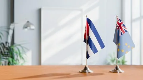 FLAGS OF CUBA AND TUVALU ON TABLE Stock Photos
