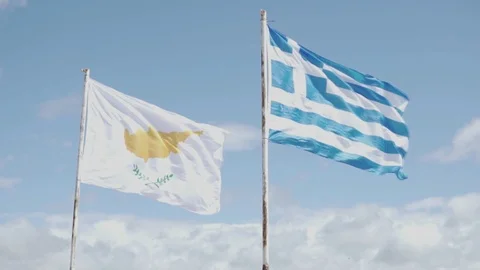 The flags of Cyprus and Greece are standing nearby Stock Footage 106354618