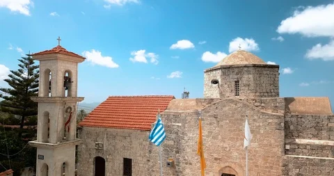 Flags of Cyprus and Greece on the flagpole near the church Video stock 127760790