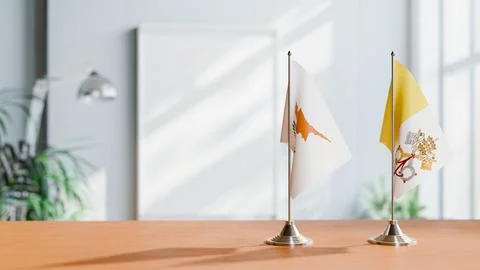 FLAGS OF CYPRUS AND VATICAN ON TABLE Stock Photos