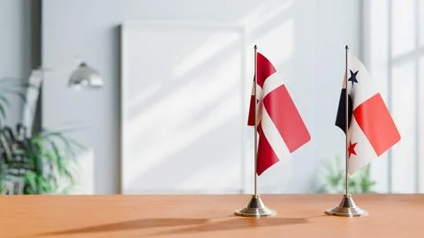 FLAGS OF DENMARK AND PANAMA ON TABLE Stock Photos