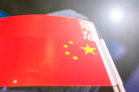 Flags of different countries against the background of blue otenkov. close-up Stock Photos