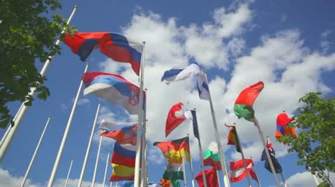 Flags of the different countries against the blue sky Video stock 16078316