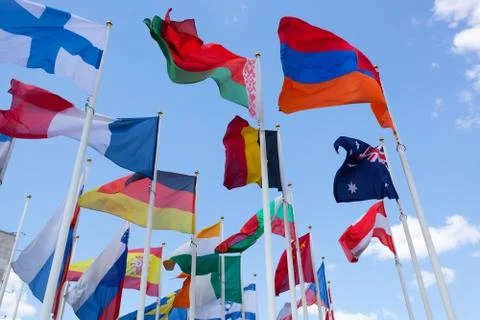 Flags of the different countries against the blue sky Fotos Stock