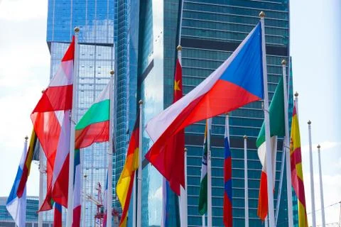 Flags of the different countries against the business center Fotos Stock