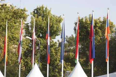 Flags of different countries against the sky Foto stock