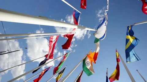 Flags of different countries flapping in sky Stock Footage 56925725