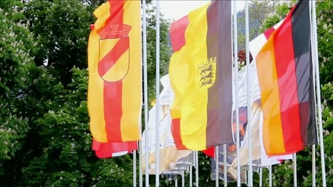 Flags of different countries fluttering in the wind near Kurhaus and Casino Bade Stock Footage 74456243