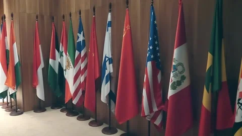 Flags of different countries gathered to sign important interstate treaties Stock Footage 287956398