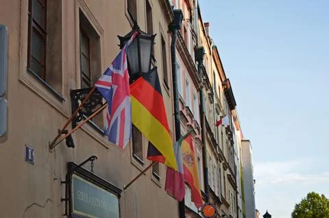 Flags of different countries, language school building Stock Photos