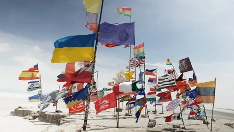  Flags of different countries at Salar de Uyuni salt lake Bolivia Stock Footage 125483694