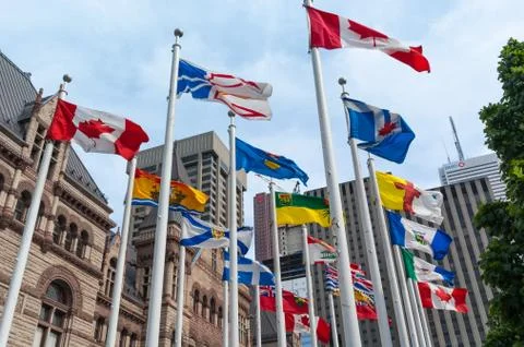 Flags of different countries waiving with wind Stock Photos