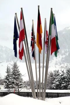 Flags of different nations in the snow Stock Photos