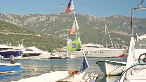 Flags of different states hang. flags of different countries hang on a rope Stock Footage 234347853