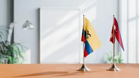 FLAGS OF ECUADOR AND NEPAL ON TABLE Stock Photos