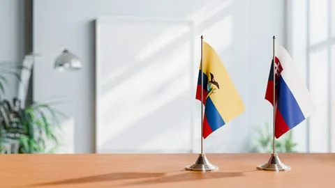 FLAGS OF ECUADOR AND SLOVAKIA ON TABLE Stock Photos
