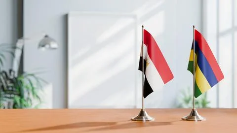 FLAGS OF EGYPT AND MAURITIUS ON TABLE Stock Photos