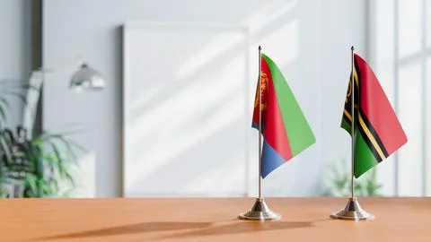 FLAGS OF ERITREA AND VANUATU ON TABLE Stock Photos