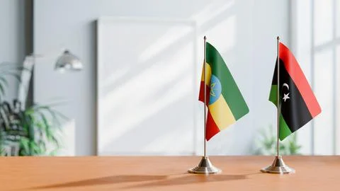 FLAGS OF ETHIOPIA AND LIBYA ON TABLE Stock Photos
