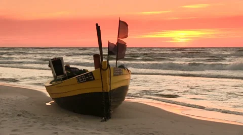 Flags flapping on the boat, Baltic Sea beach Stock Footage 32594413