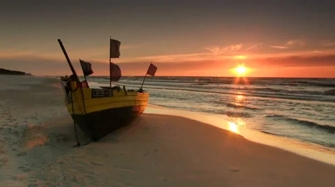 Flags flapping on the boat, Baltic Sea beach Stock Footage 32594418