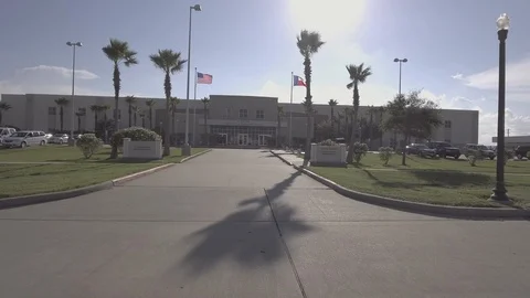 Flags Flapping in Front of Galveston Law Enforcement Facility HD Video Stockbeeldmateriaal 91791318