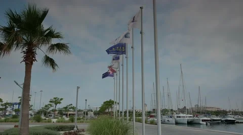 Flags flattering in the marina 4k Stock Footage 54380725