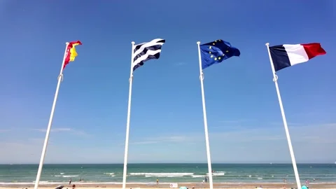 Flags fluttering along Dunkirk beach France Stock-Footage 342815502