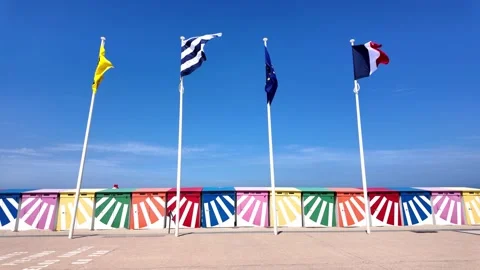 Flags fluttering along Dunkirk beach France Vídeo Stock 342815516